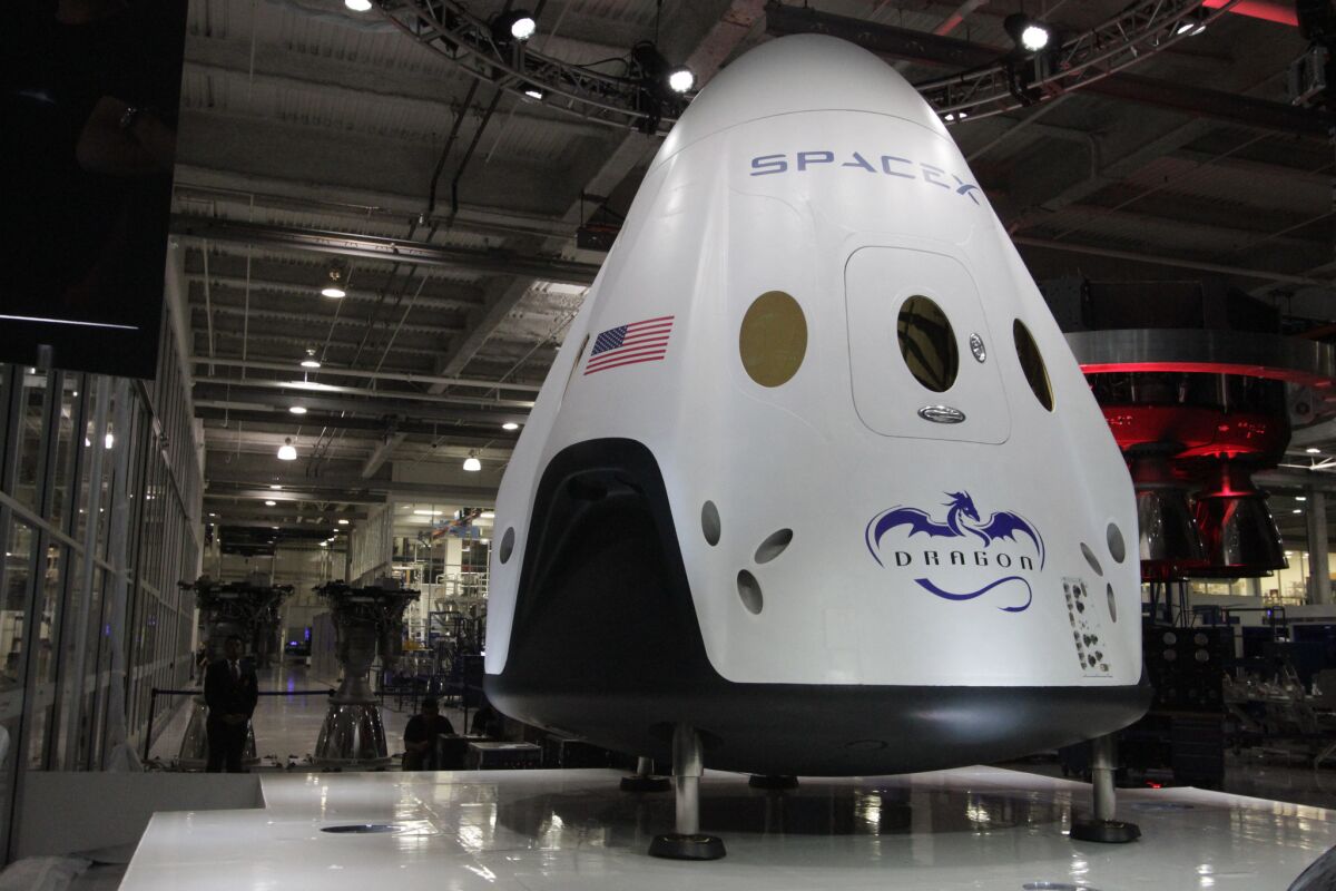 SpaceX's Dragon V2 capsule is designed to carry seven people into space and be reusable.