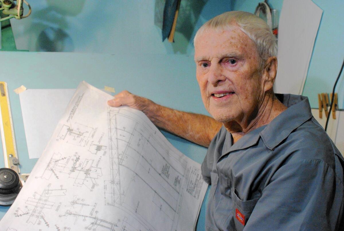 Engineer Oscar Carl Holderer, one of Wernher von Braun's original rocket team members, in his home workshop in Huntsville, Ala., in 2008. He helped design the rocket that took astronauts to the moon.