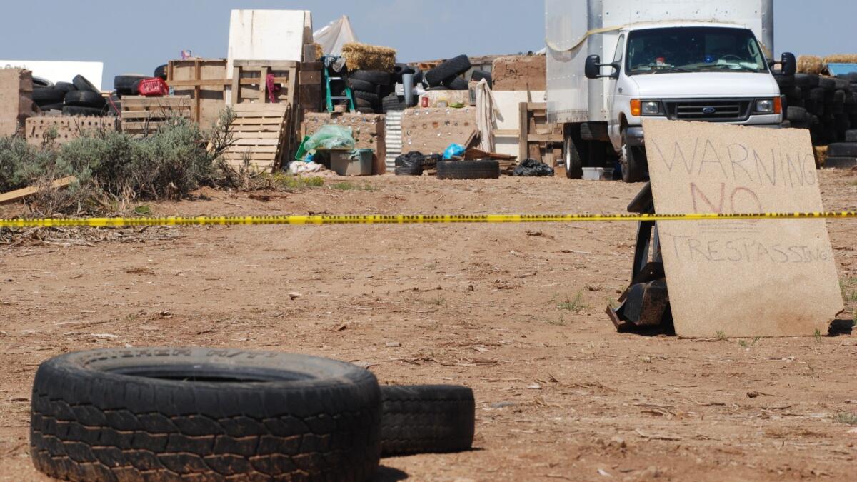 A New Mexico sheriff said searchers have found the remains of a boy at the makeshift compound that was raided in search of a missing Georgia child.