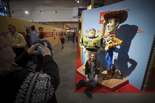 Lego versions of "Toy Story" characters greet attendees of the annual American International Toy Fair in New York.