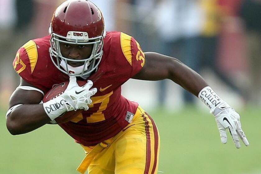 USC tailback Javorius Allen gains yards in the Trojans' 19-3 victory over Utah.