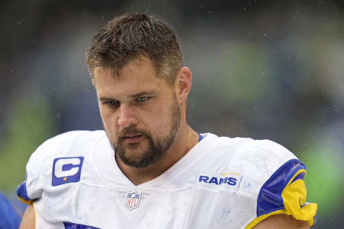 Rams offensive tackle Rob Havenstein walks on the sideline 