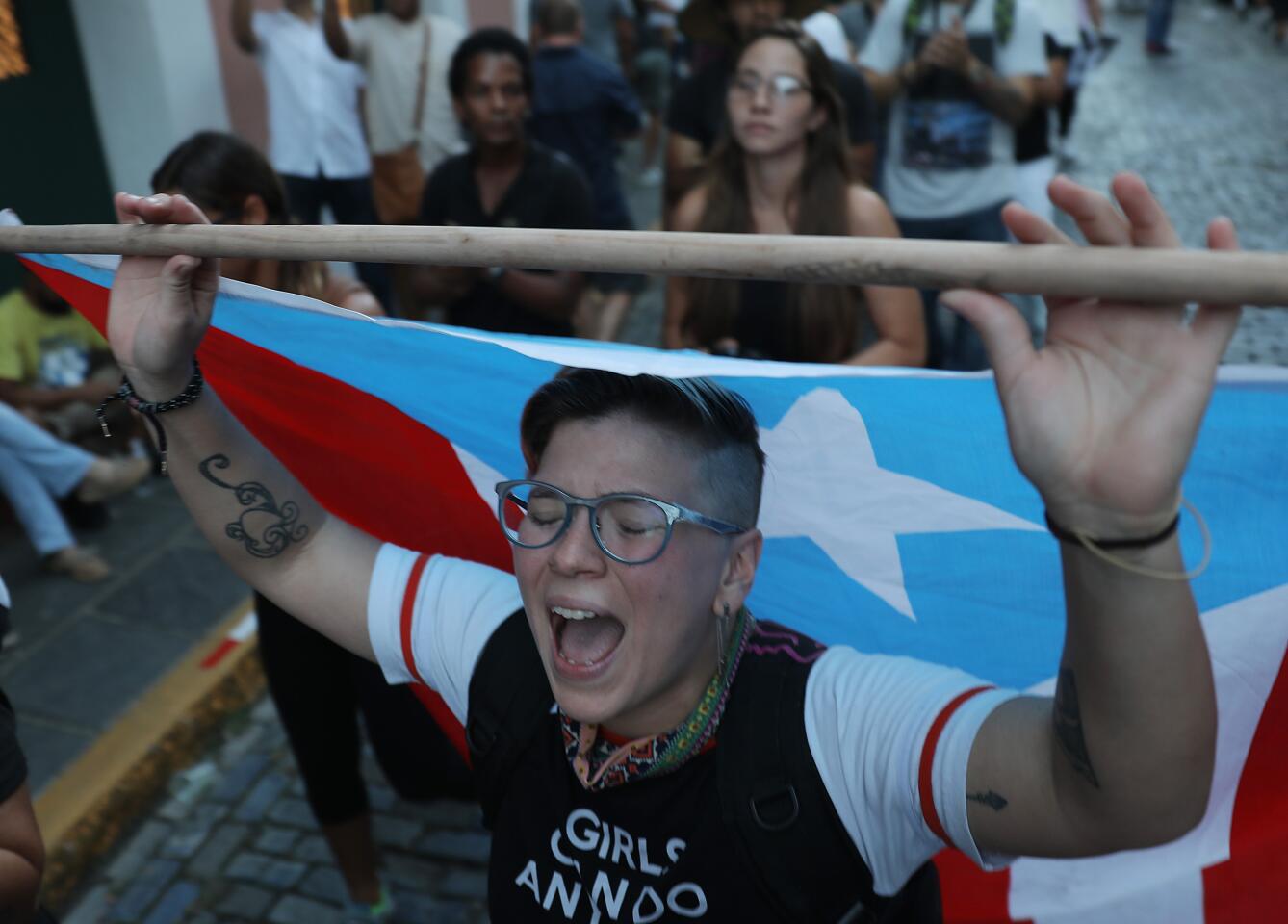 Crowd calls for Puerto Rico Governor Ricardo Rossello Resignation over leaked chats.