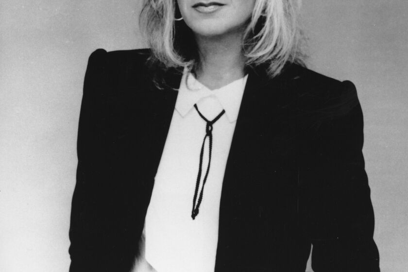 This is a photo of Christine McVie, a member of the musical group Fleetwood Mac, in Feb. 1983. (AP Photo)