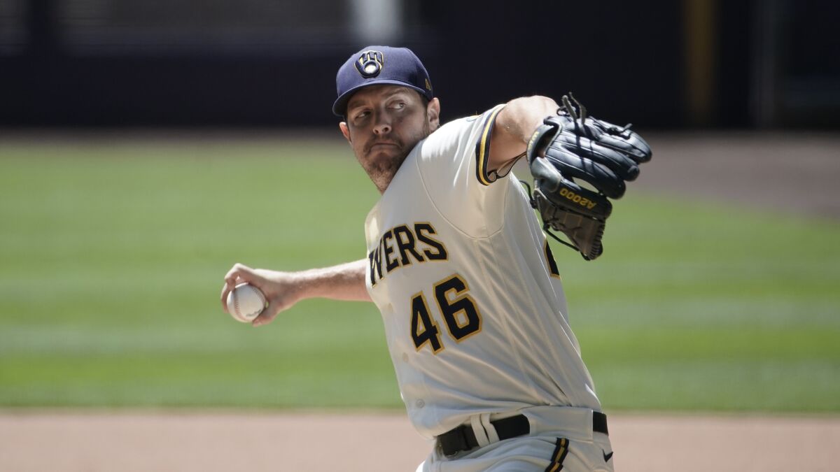 Milwaukee Brewers' Corey Knebel throws during a practice session.