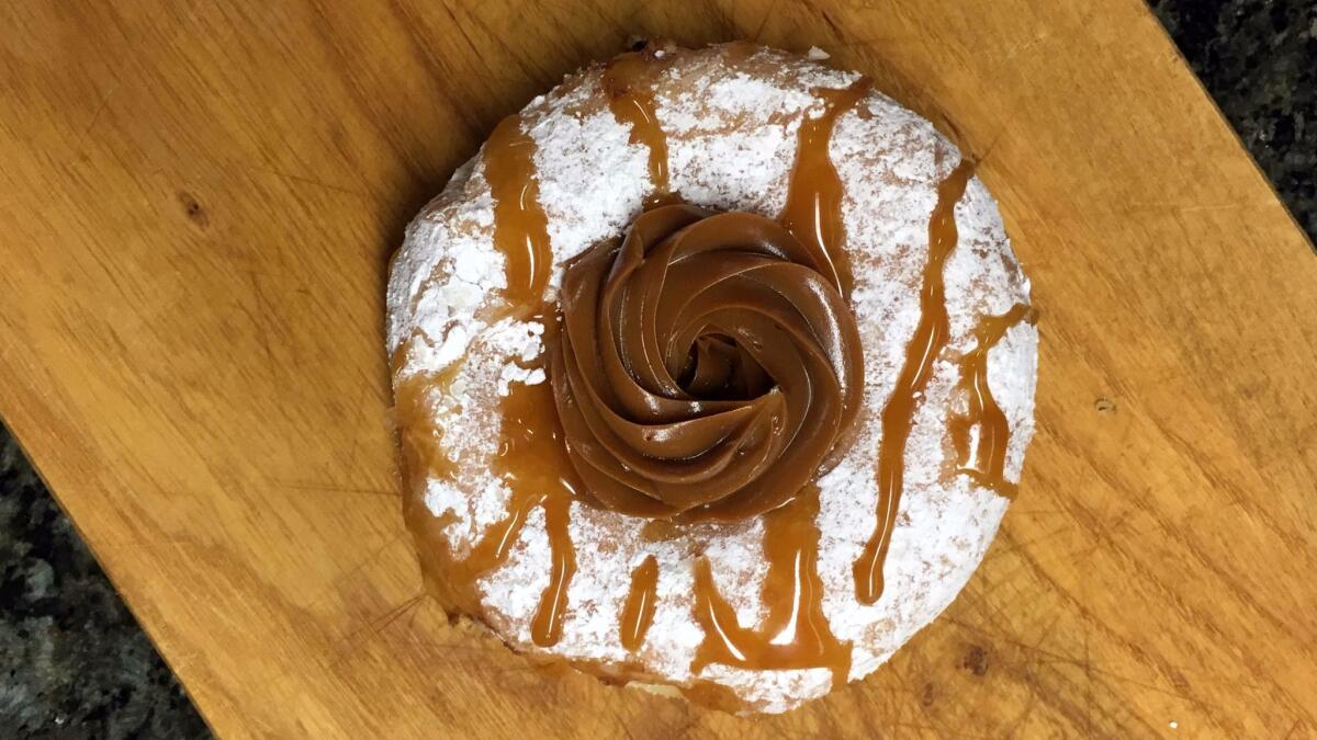 Dulce de leche doughnut from SK Donuts. (Jenn Harris / Los Angeles Times)