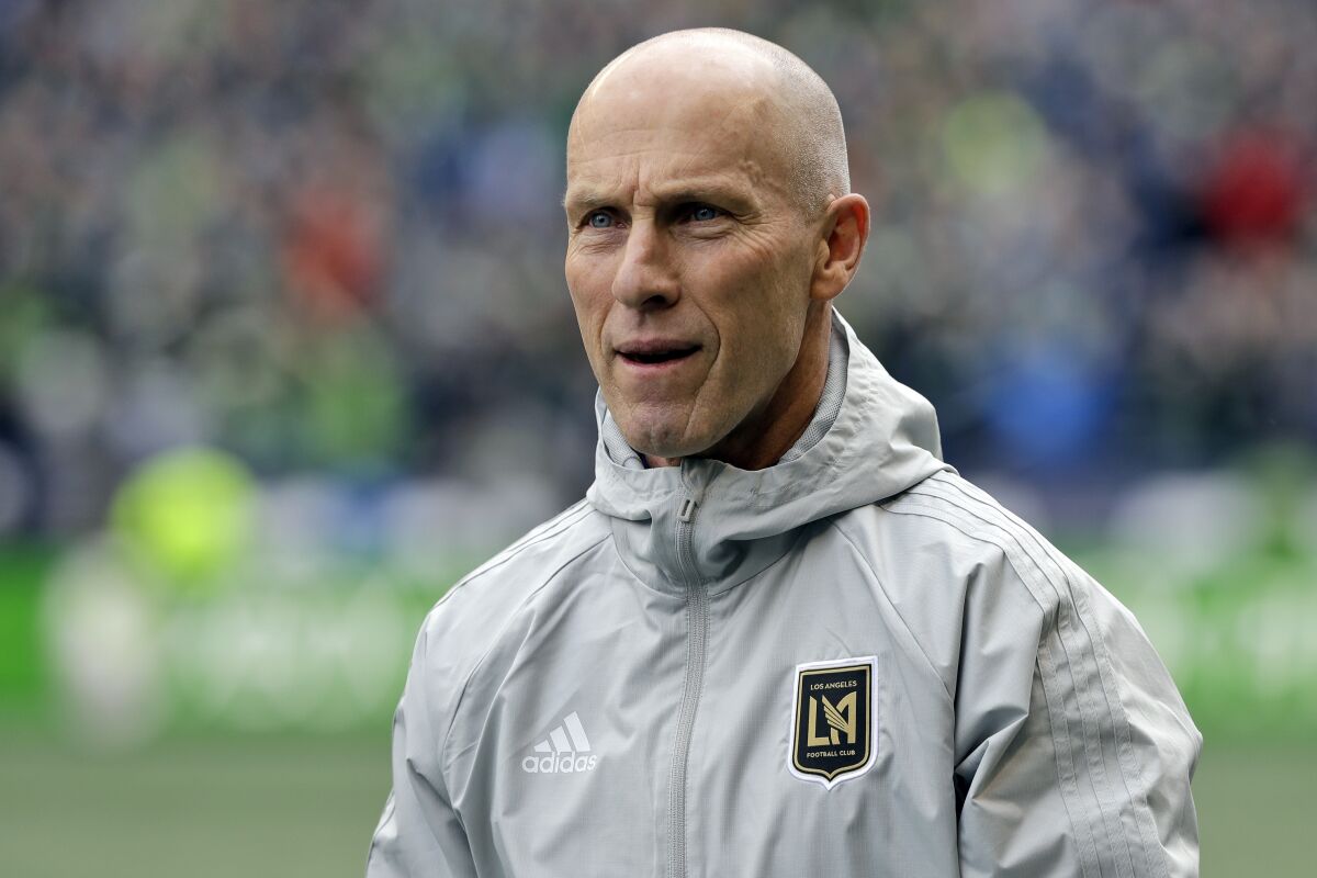 FILE - In this March 4, 2018, file photo Los Angeles head coach Bob Bradley walks across the pitch.