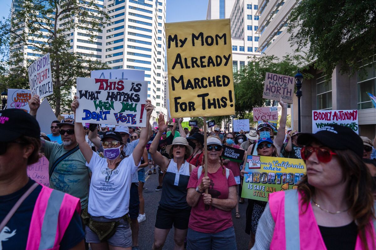 Protesters march at an abortion rights rally in downtown San Diego on May 14, 2022 