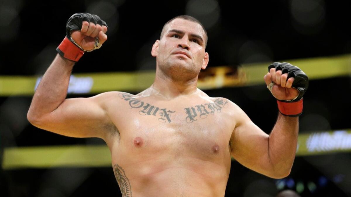 Cain Velasquez celebrates after defeating Travis Browne in their heavyweight bout at UFC 200 on July 9 in Las Vegas.