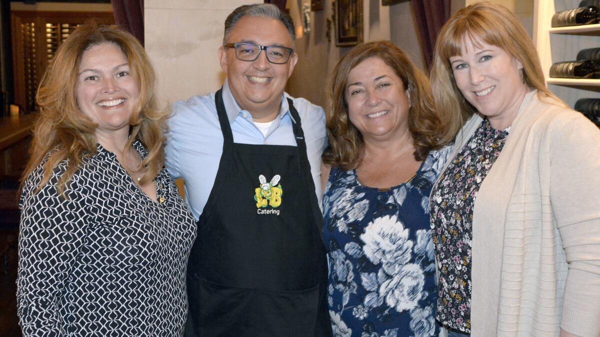 Welcoming supporters to last week's kick off mixer to support the Burbank Educational Foundation are Ana Connell, from left, Eric Carter, Char Tabet and Amy Kamm.