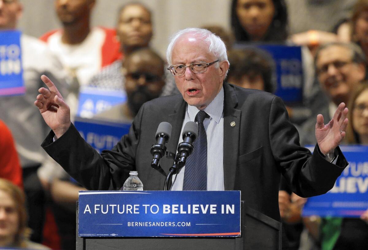 Democratic presidential hopeful Bernie Sanders speaks at a rally in Akron, Ohio, on March 15. Sanders and Republican rival Donald Trump connect with blue-collar voters but from opposite ends of the spectrum.