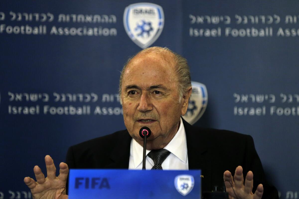 FIFA President Sepp Blatter speaks during a news conference in Jerusalem on Tuesday.
