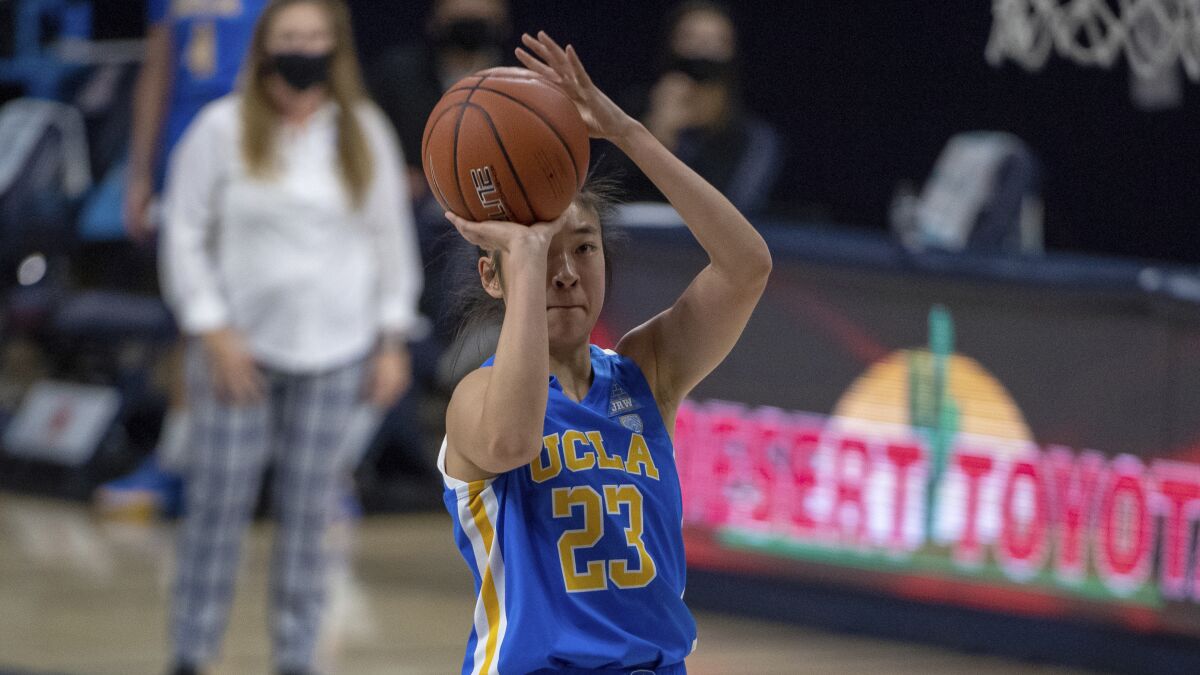 UCLA guard Natalie Chou shoots a free throw against Arizona.
