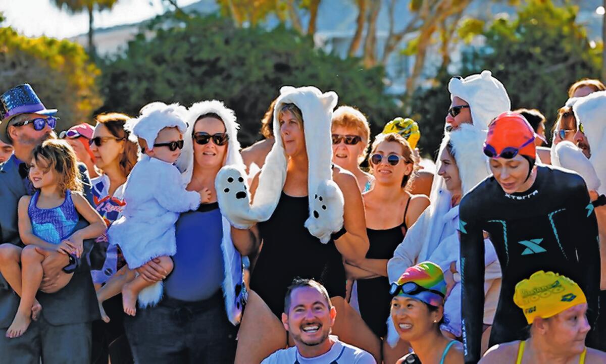 Annual polar bear plunge at La Jolla Shores serves as hangover