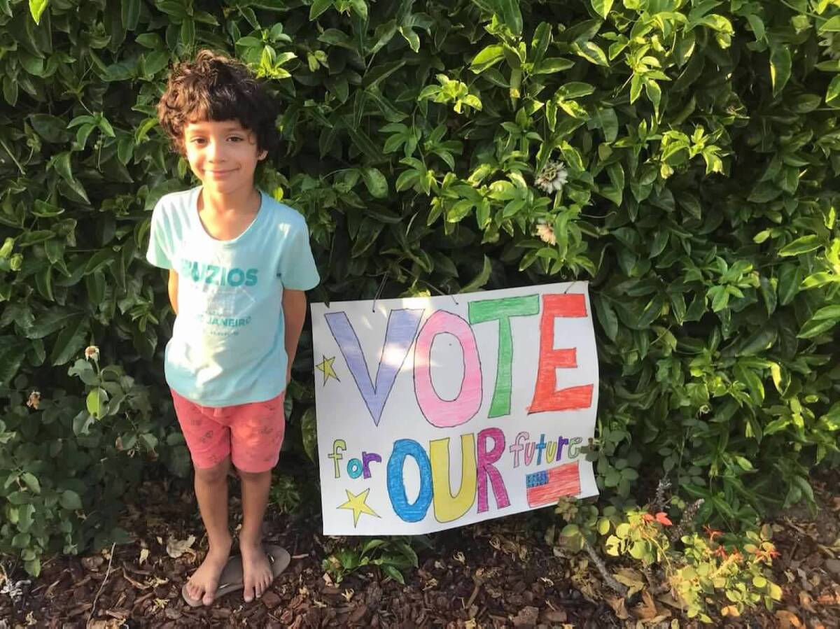 Kristi Nelson hopes all her students, like this one in her first-grade class, will make a difference in their community.