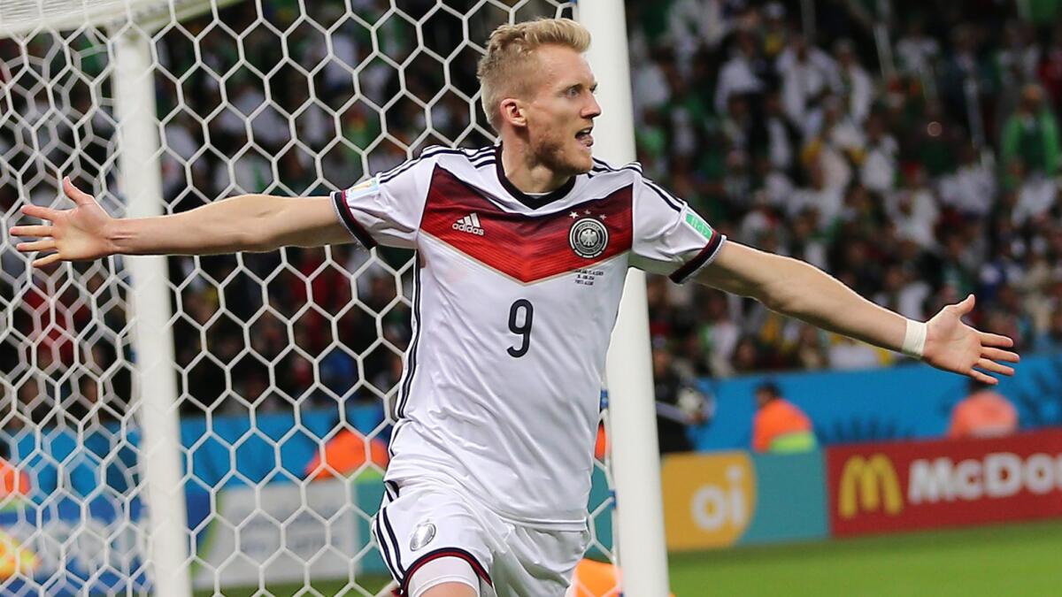 Germany's Andre Schuerrle celebrates after scoring during the team's 2-1 victory over Algeria at the World Cup on Monday.