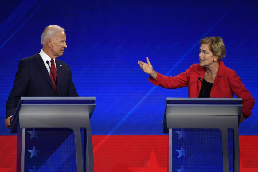 Democratic presidential hopeful Massachusetts Senator Elizabeth Warren (R) speaks as Former Vice President Joe Biden listens during the third Democratic primary debate of the 2020 presidential campaign season hosted by ABC News in partnership with Univision at Texas Southern University in Houston, Texas on September 12, 2019. (Photo by Robyn BECK / AFP) (Photo credit should read ROBYN BECK/AFP/Getty Images)