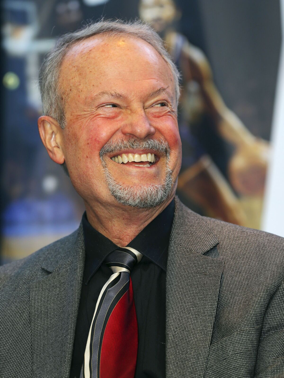 FILE - In this Feb. 13, 2015, file photo, Dr. Richard Lapchick speaks at The National Basketball Retired Players Association (NBRPA) Celebration of Black History Month at the Marriott Marquis as part of NBA All-Star 2015 in New York. Lapchick shares some of the backlash his family felt that was directed at his father for signing the first Black player to an NBA contract. (Adam Hunger/AP Images for NBRPA, File)
