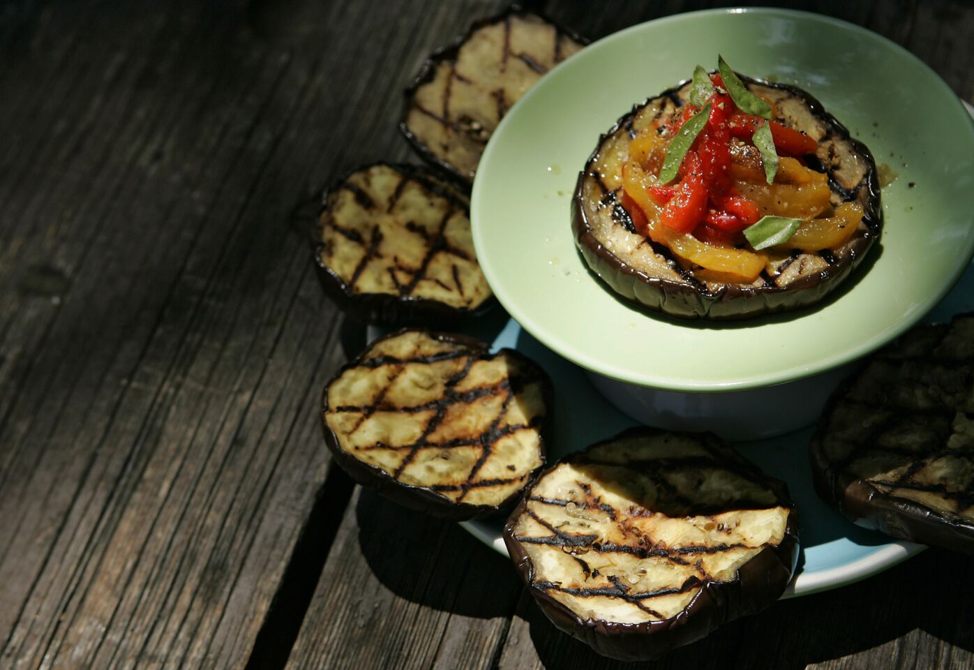 Grilled eggplant with red and yellow peppers