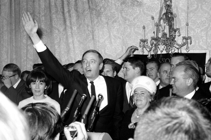 **FILE**Conservative Party candidate William F. Buckley Jr., waves to the crowd during his concession speech as his unsuccessful campaign to be New York City mayor ended, at his election headquarters in New York early Nov. 3, 1965, Buckley, the erudite Ivy Leaguer and conservative herald who showered huge and scornful words on liberalism as he observed, abetted and cheered on the right's post-World War II rise from the fringes to the White House, died Wednesday, Feb. 27, 2008. He was 82.(AP Photo/John J Lent)