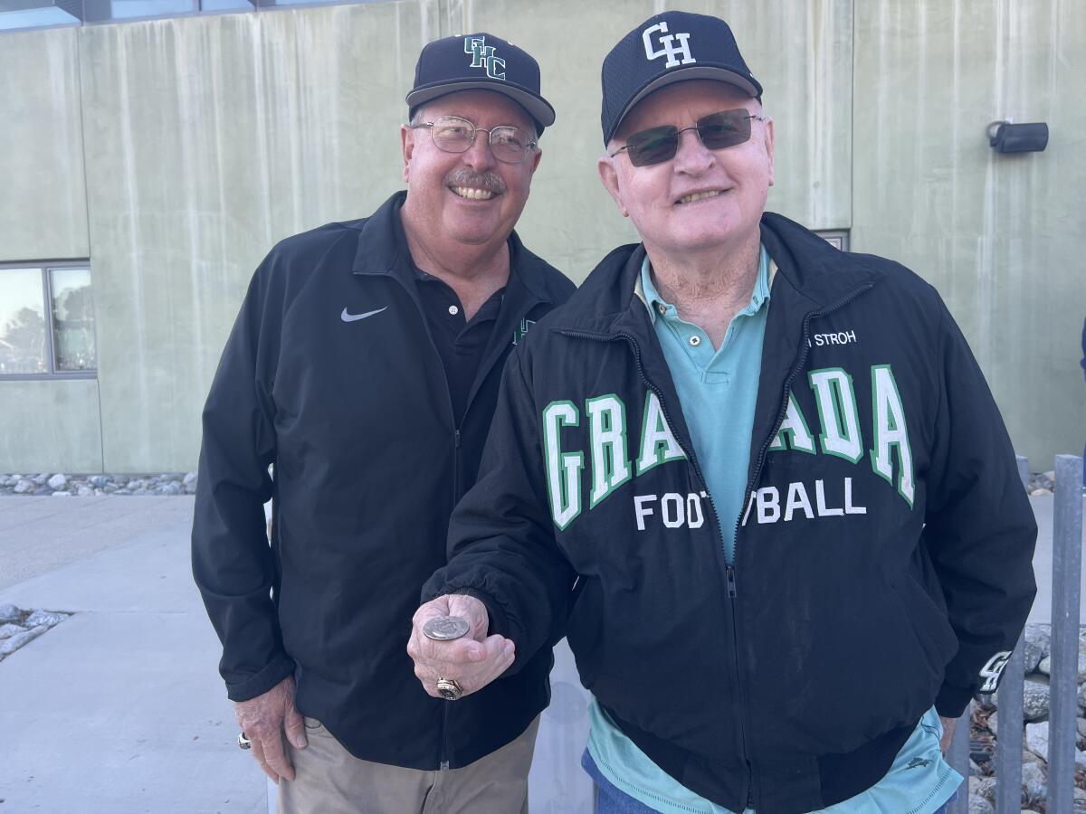 Former Granada Hills football and baseball coach Darryl Stroh (right) 