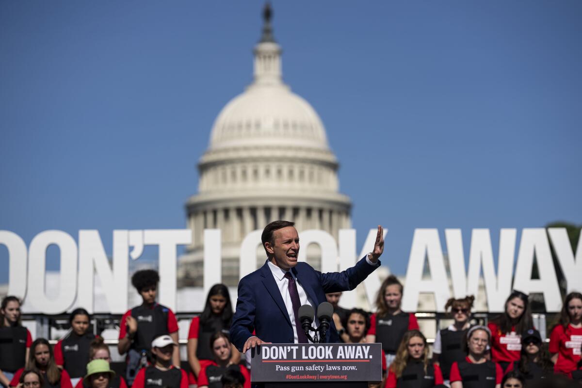Sen. Chris Murphy speaks during a gun safety reform rally near the Capitol Reflecting Pool on Monday.