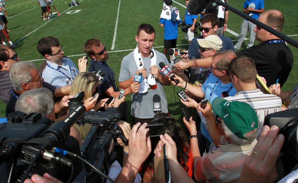 Cleveland quarterback Johnny Manziel talks to the media Friday during an NFL Play 60 youth event at the Cleveland Browns practice facility.