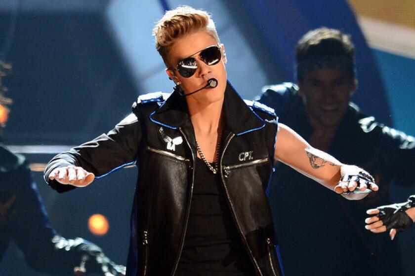 Singer Justin Bieber performs during the 2013 Billboard Music Awards May 19 in Las Vegas.