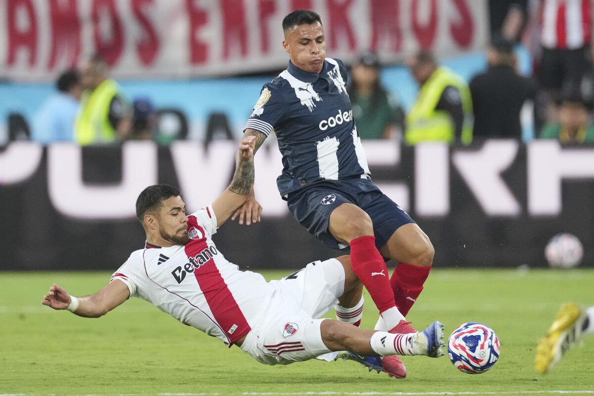 River Plate's Paulo Diaz battles for the ball with Monterrey's Roberto