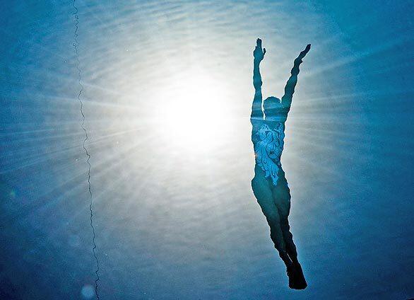 This underwater image shows Russia's Natalia Ishchenko competing during the synchronized solo free final at the FINA World Championships in Rome.