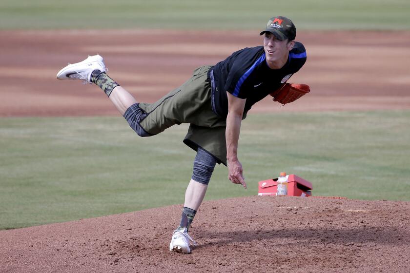 Tim Lincecum throws for baseball scouts at Scottsdale Stadium in Scottsdale, Ariz., on May 6.