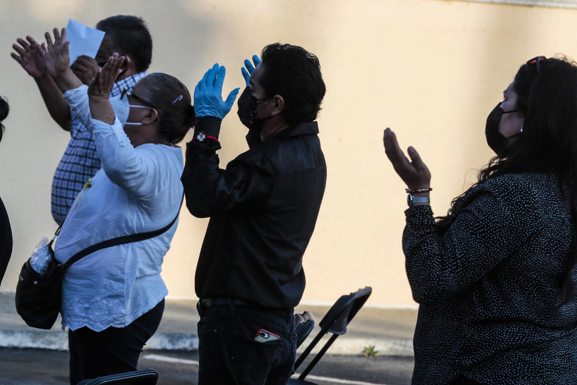 Mourners at the funeral of Felipe Juarez.