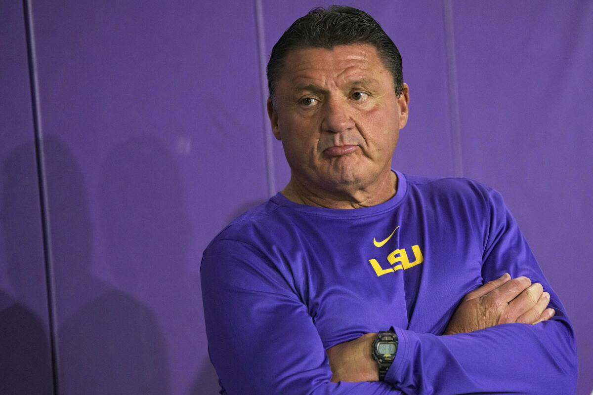 LSU coach Ed Orgeron waits to be interviewed pro day 