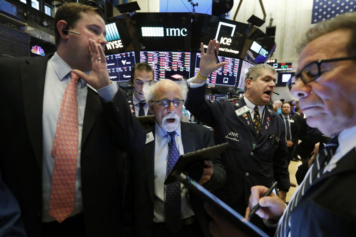 Brendan Connolly, left, New York Stock Exchange floor governor, left with traders