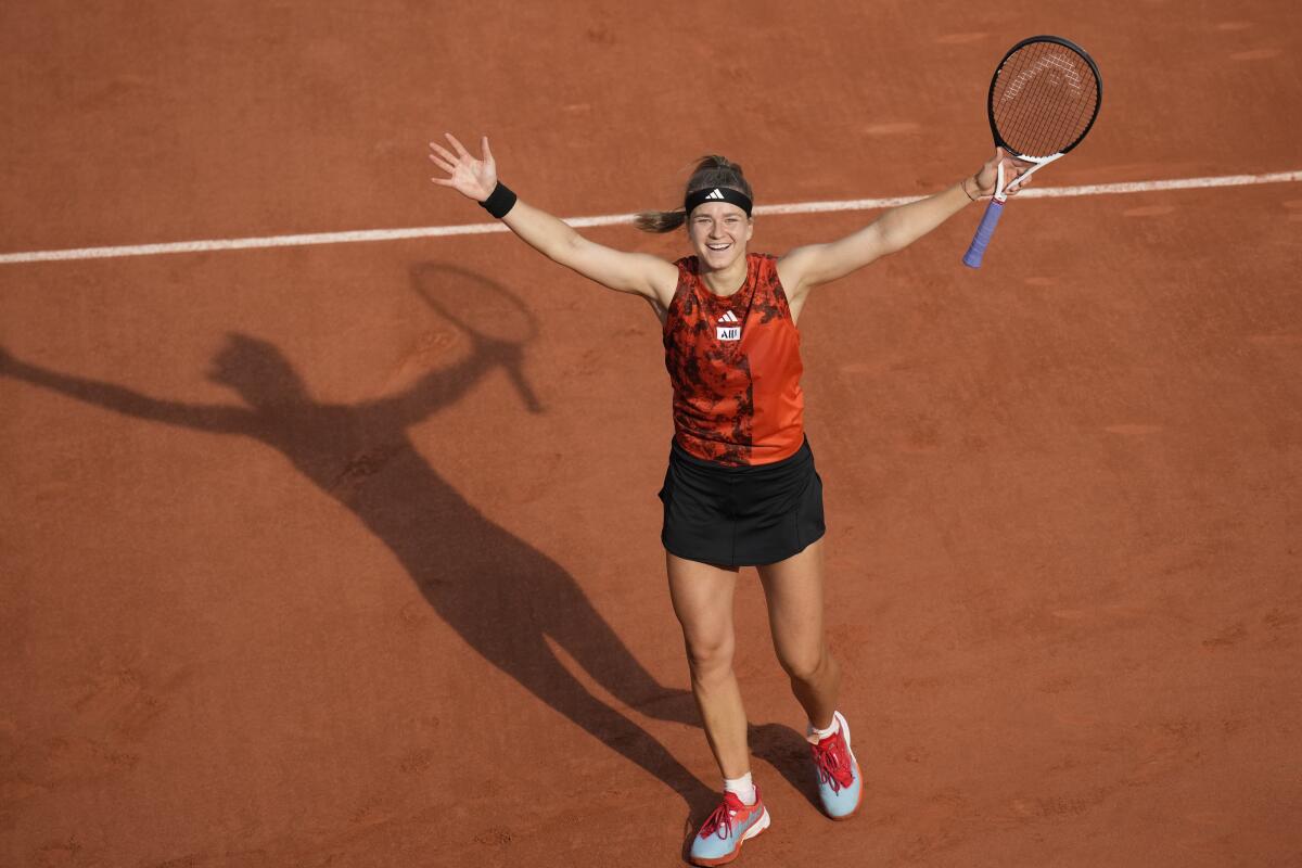Karolina Muchova celebrates after defeating the Aryna Sabalenka in the French Open women's singles semifinals .