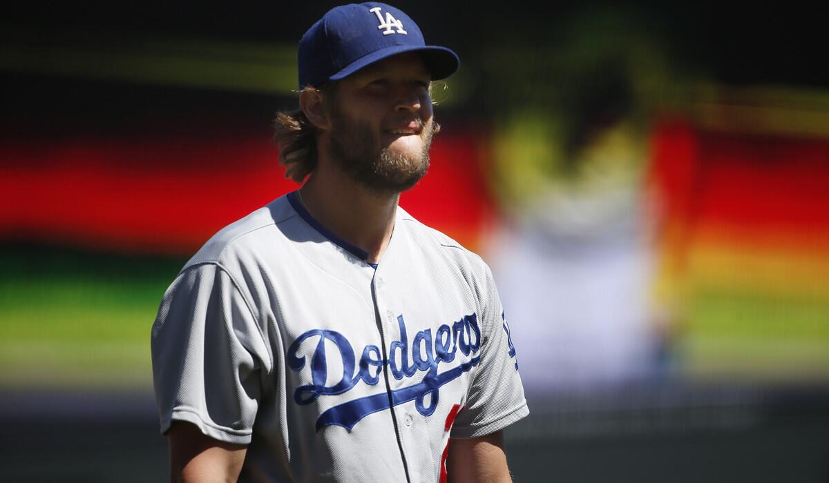 Starting pitcher Clayton Kershaw became the first 19-game winner in the majors when he led the Dodgers to a 4-2 victory over the Giants on Sunday afternoon in San Francisco.