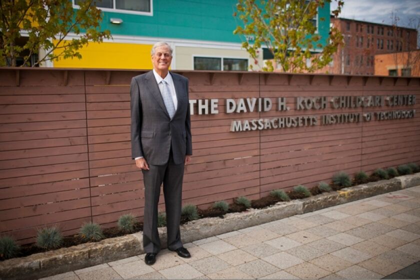 MIT's obituary of David Koch showed him standing proudly in front of a childcare center he funded.