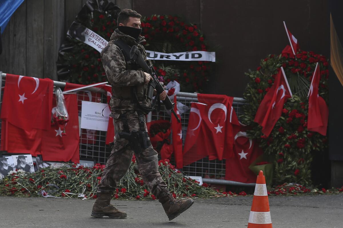 A Turkish special security force member patrols Jan. 4 near the scene of the Reina nightclub, where a gunman killed 39 during New Year's celebrations.