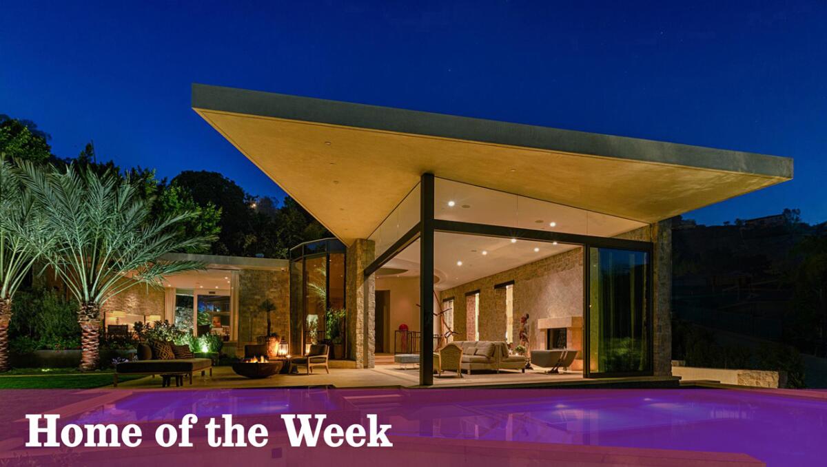 The newly built contemporary house at 9233 Swallow Drive, Los Angeles, is listed for sale at $21.85 million.