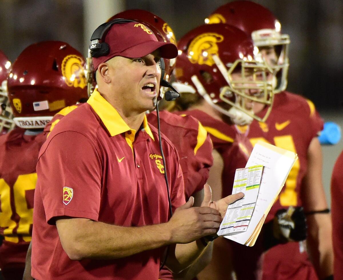 Clay Helton coaches the Trojans against Utah on Oct. 24.