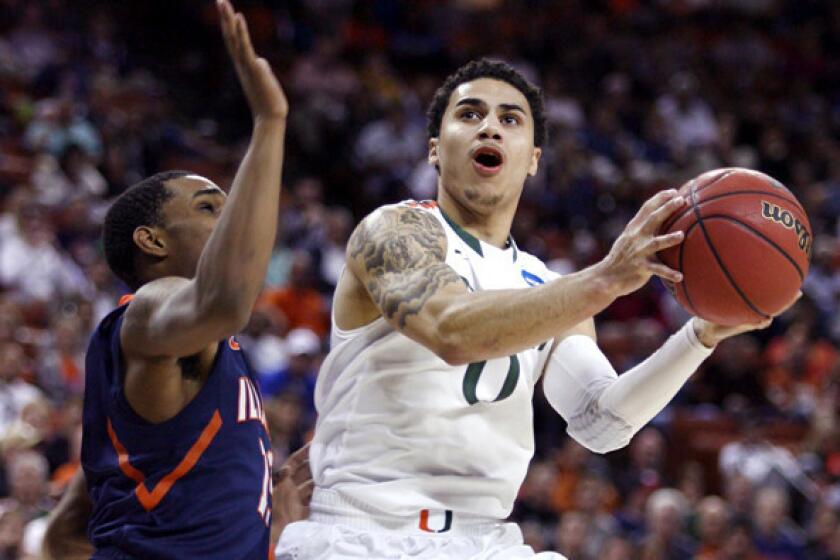 Miami's Shane Larkin is one of six point guard who worked out with the Clippers on Wednesday.