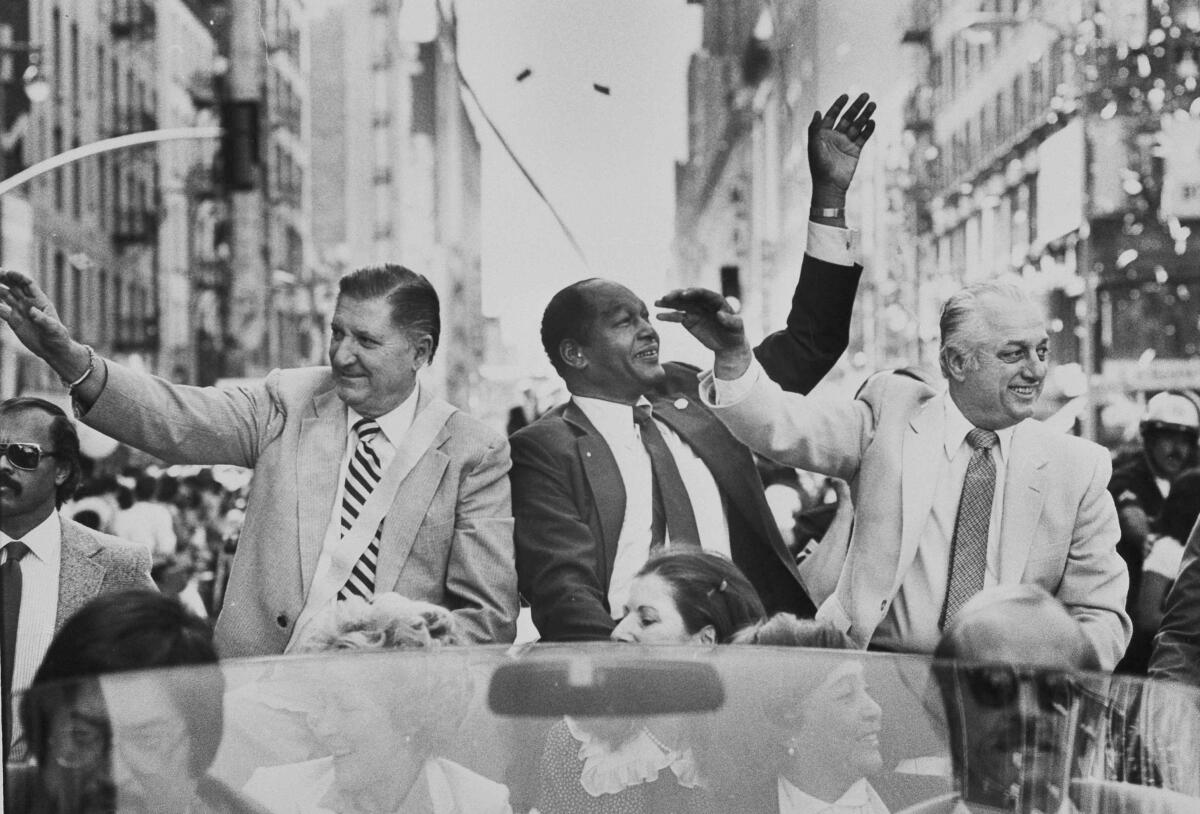 Al Campanis, Dodgers vice president of player personnel, L.A. Mayor Tom Bradley and Tom Lasorda during 1981 parade.