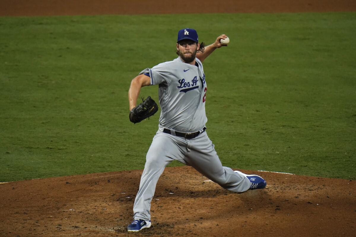 Dodgers starting pitcher Clayton Kershaw throws against the Angels.