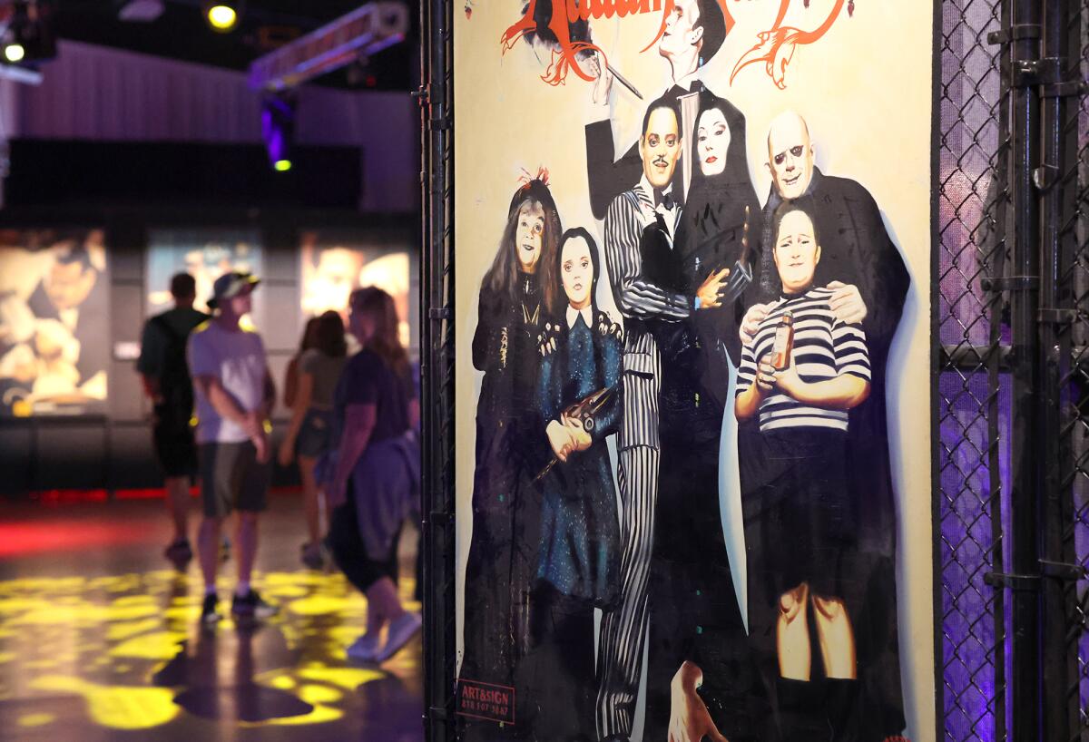 A larger-than-life poster from "The Addams Family" on display at the "Rewind" exhibit at the O.C. Fair.