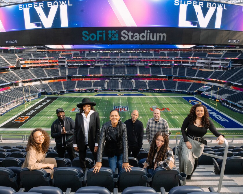 The team behind the Super Bowl halftime show, gathered in SoFi Stadium stands