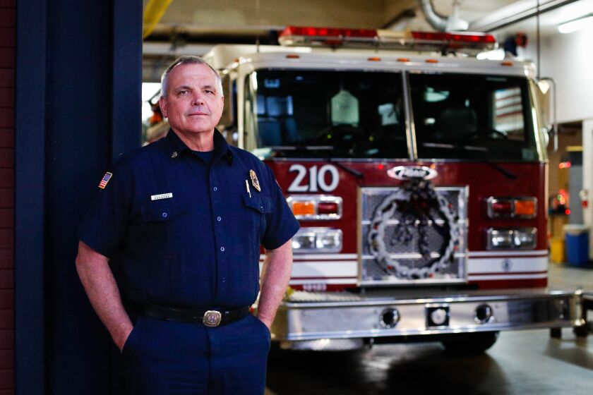 Lemon Grove, CA - December 20: Heartland Fire Department chief Steve Swaney poses for a photo at Heartland Fire Station Station 10 on Tuesday, Dec. 20, 2022 in Lemon Grove, CA. Swaney is stepping down as chief, which serves El Cajon, Lemon Grove and La Mesa, but will continue to help launch a major overhaul of El Cajon's 911 dispatch system to reduce ambulance trips and ER wait times. (Meg McLaughlin / The San Diego Union-Tribune)