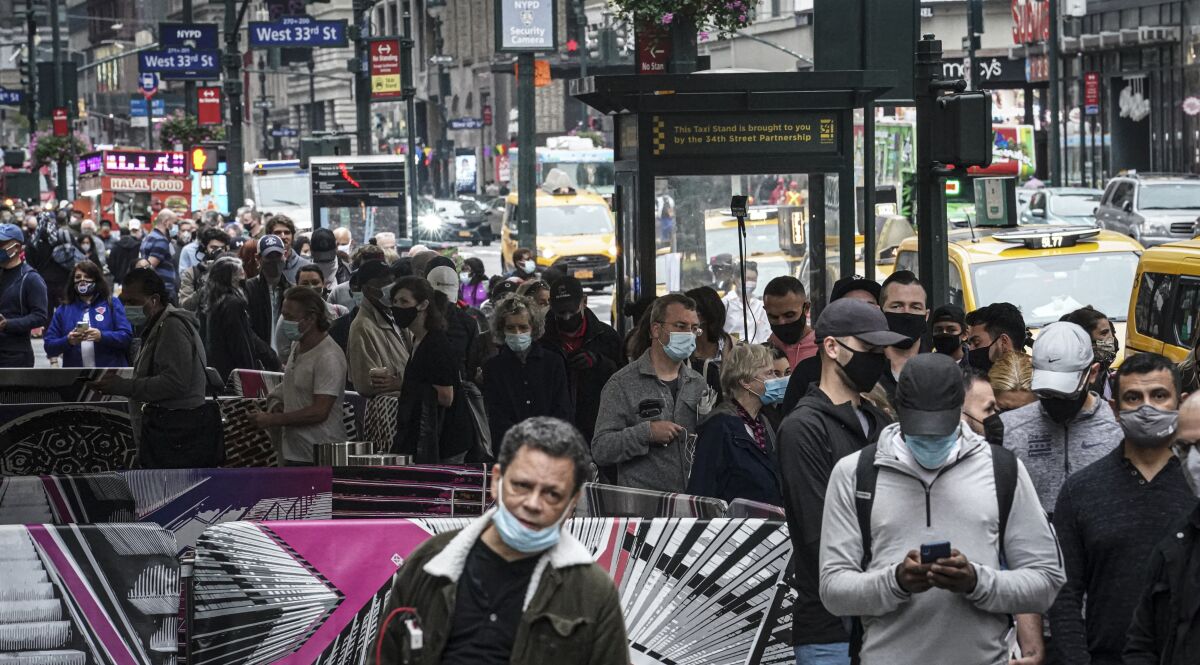 Voters wait in line for blocks to vote early at Madison Square Garden in New York