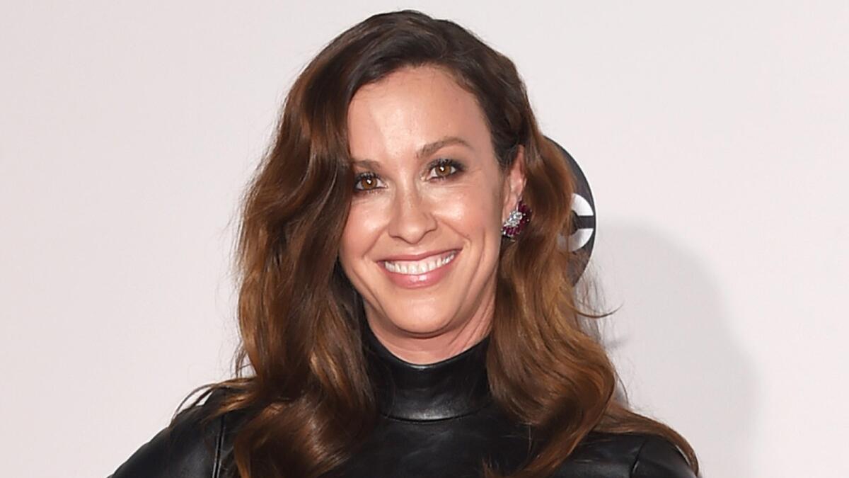 Alanis Morissette is seen at the American Music Awards in November 2015.