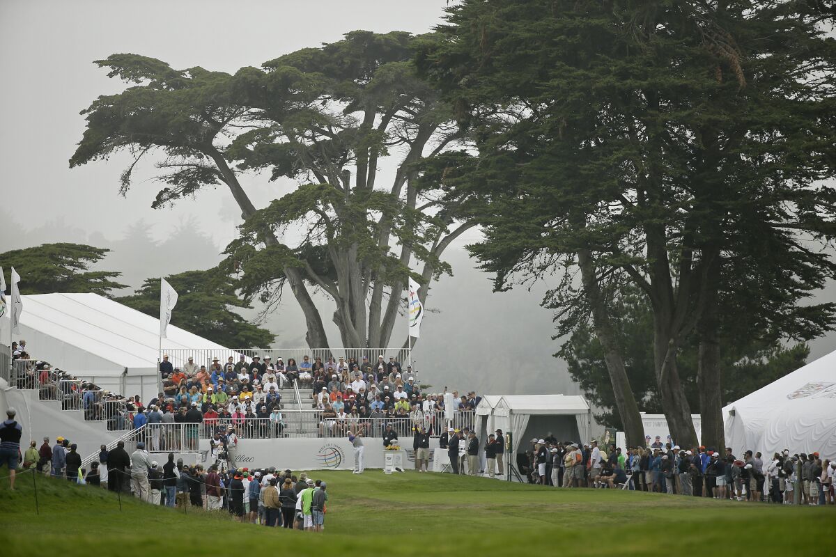 FILE - In this Friday, May 1, 2015 file photo, Jordan Spieth hits from the first tee of TPC Harding Park during round-robin play against Lee Westwood of England at the Match Play Championship in San Francisco.The PGA Championship starts Aug. 6 at Harding Park, delayed three months by the coronavirus pandemic. (AP Photo/Eric Risberg, File)