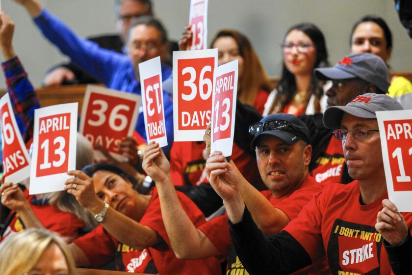 Supporters and members of the California Faculty Assn. attend a meeting of Cal State trustees in Long Beach on March 8.